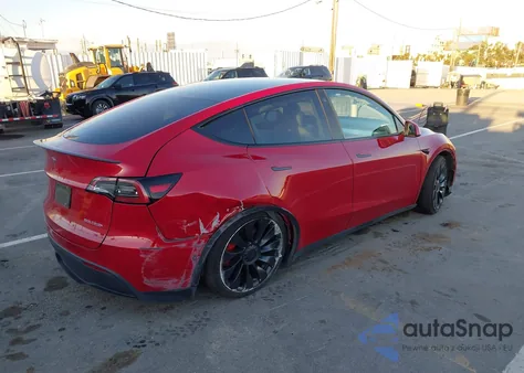 2022 Tesla Model Y Performance Dual Motor All-Wheel Drive z USA, uszkodzony, nr VIN 7SAYGDEFXNF511441